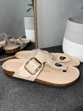 Project Cloud Women’s Nude Leather Toe-Post Sandal with Gold Buckle